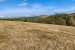 Slnečný pozemok s panoramatickými výhľadmi v Dolnom Hričove - Peklina obrázok 1